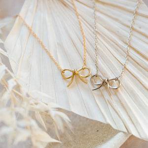 Utepe Brass Bow Necklace