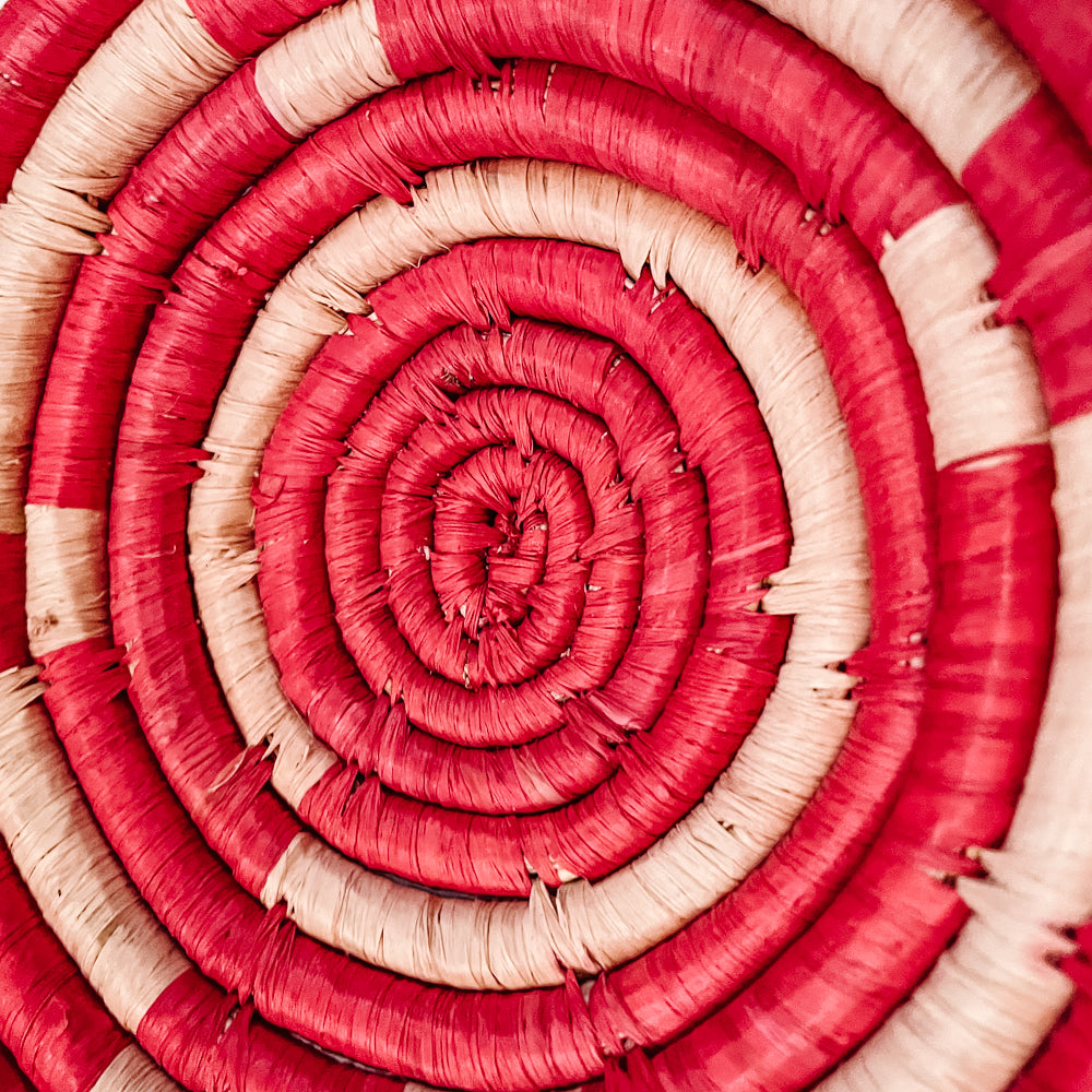 JustOne's small red and tan basket handwoven in Uganda