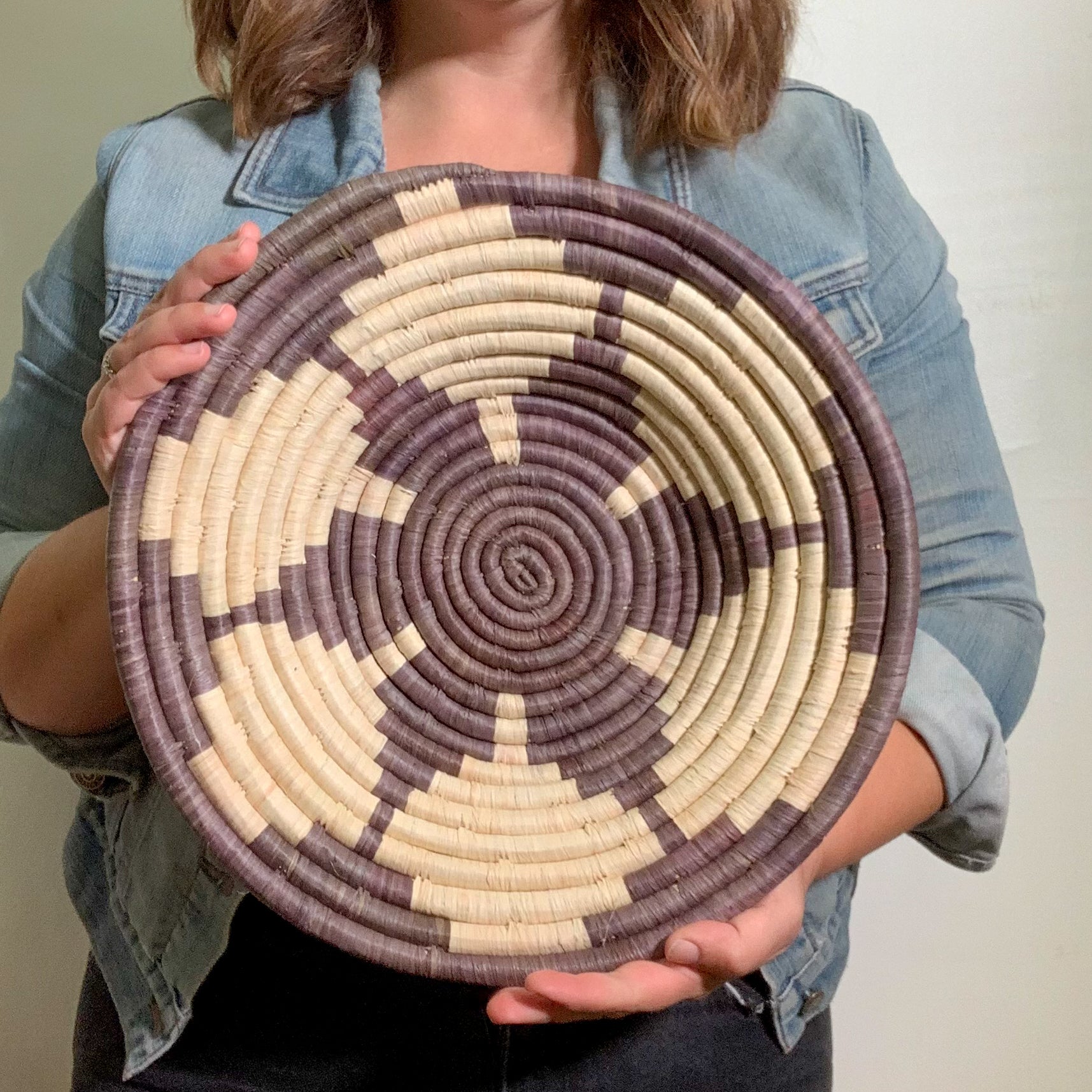 JustOne's purple-grey basket with tan handwoven in Uganda