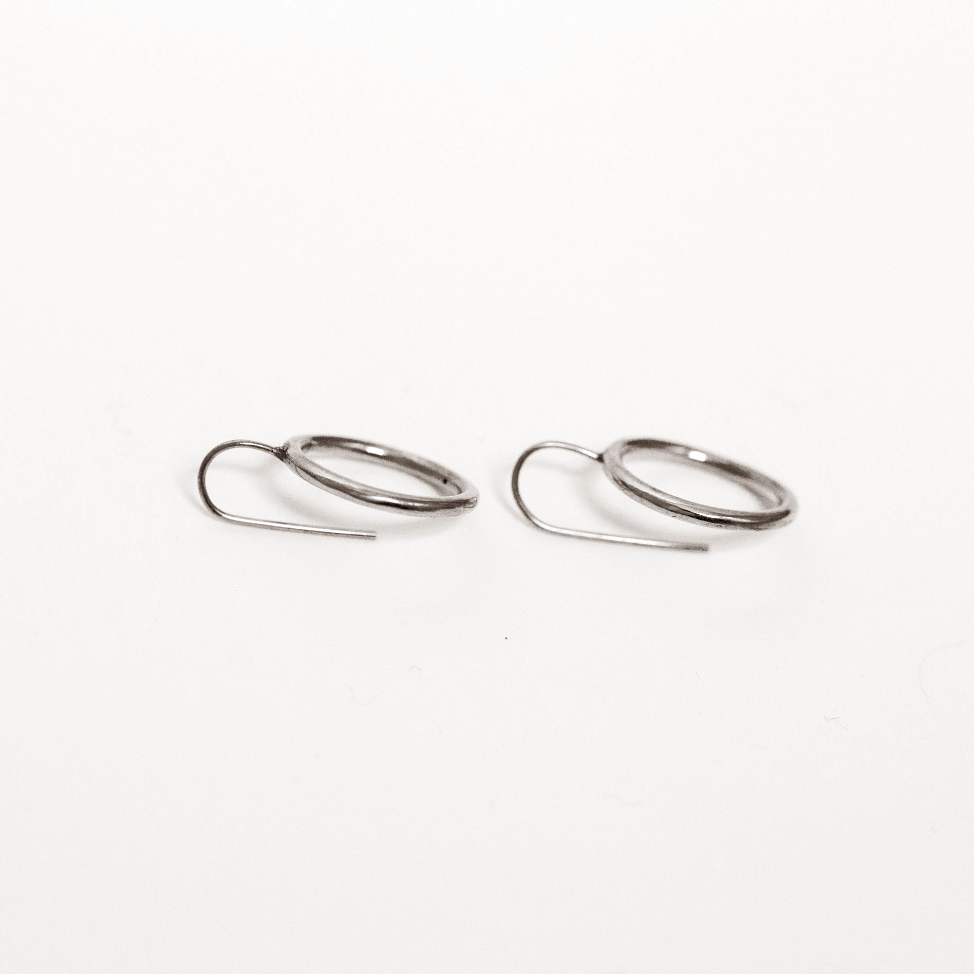 JustOne's small silver hoop earrings, handcrafted in Kenya