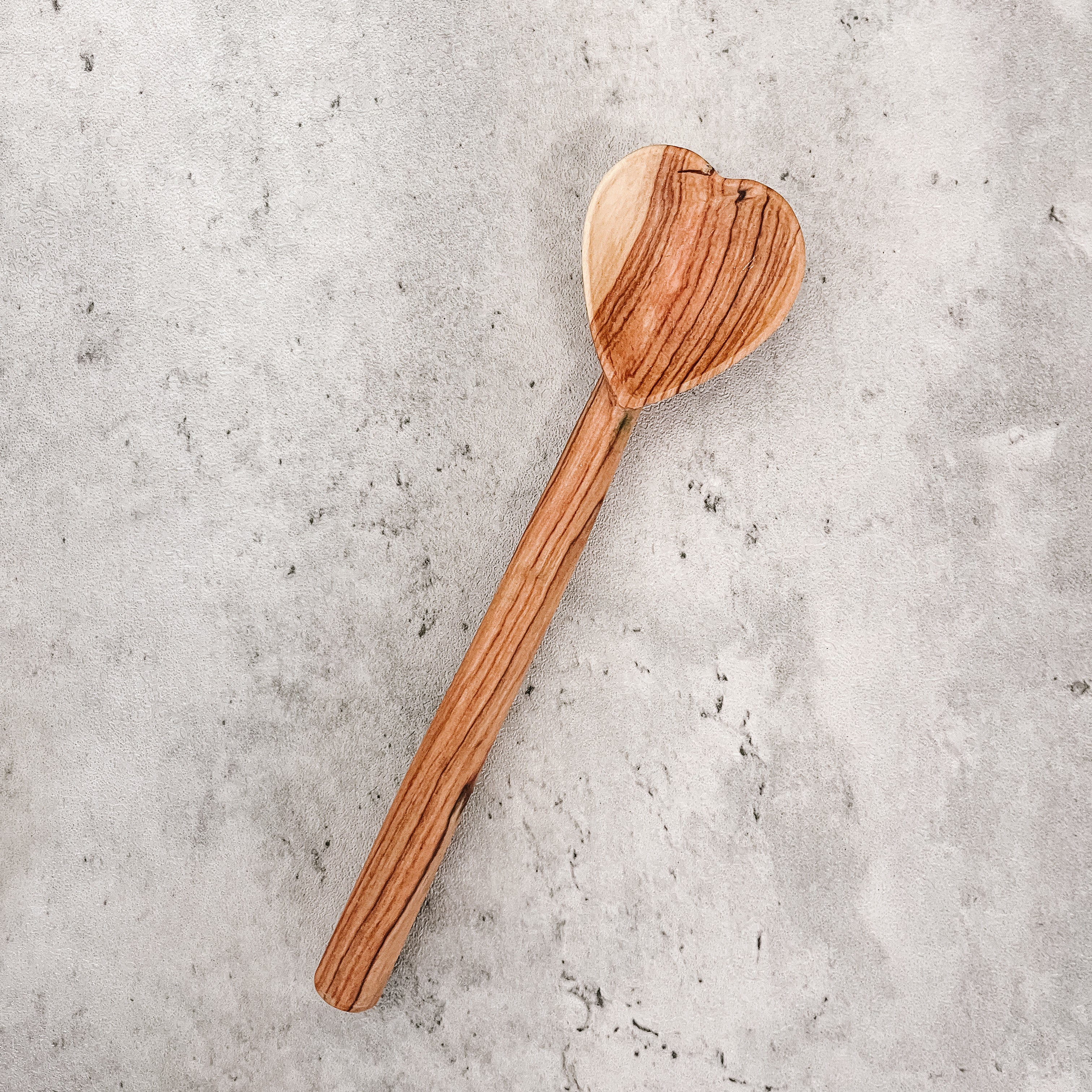 JustOne's tea spoon with the scoop in the shape of a heart, handcrafted in Kenya